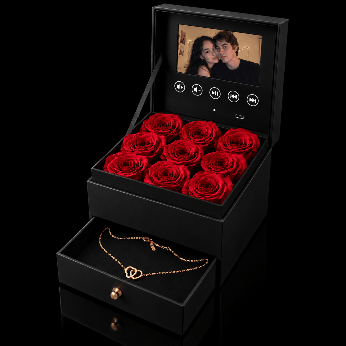 The Promise movie box from the side, drawer open with the engraved necklace