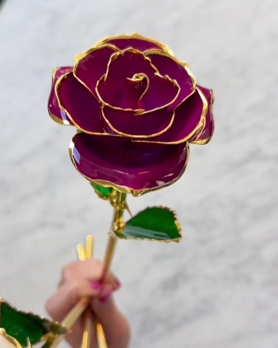 A real rose, preserved, under the gold.