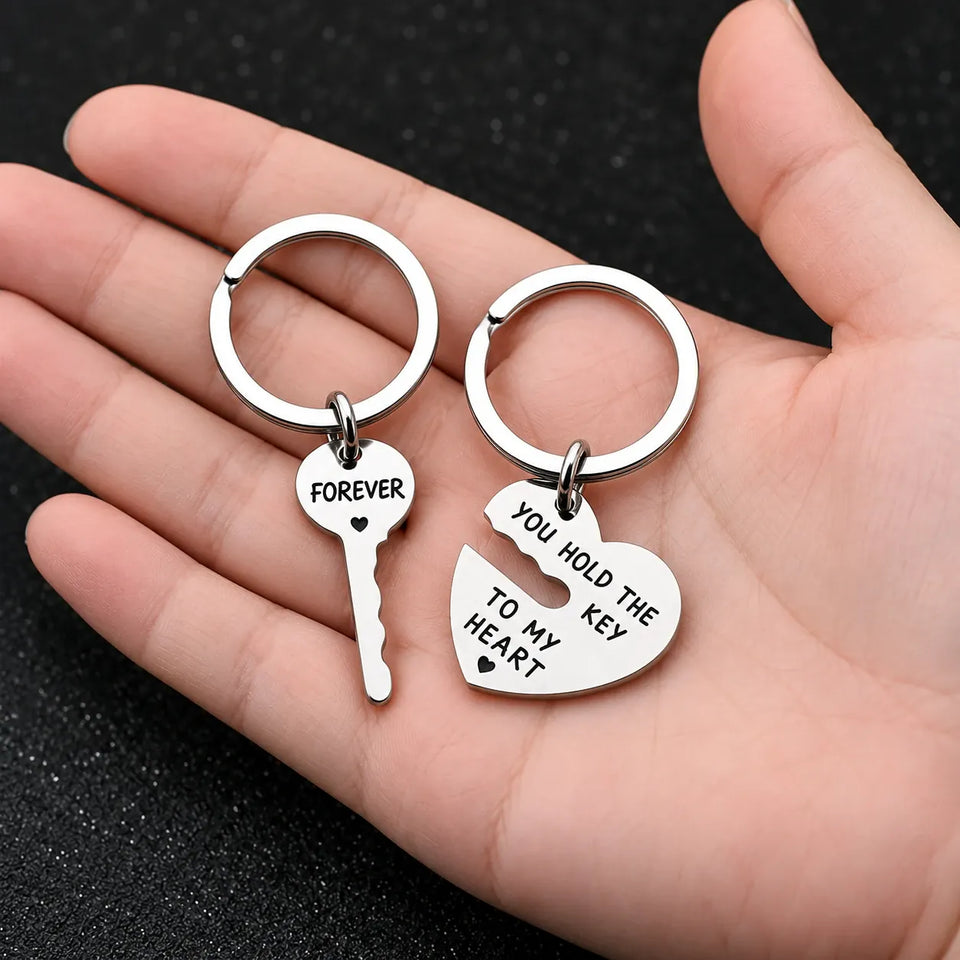 Keychain pair held in a hand