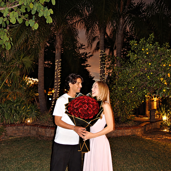 Glitter Rose Bouquet, Red, 50 roses, held by a couple