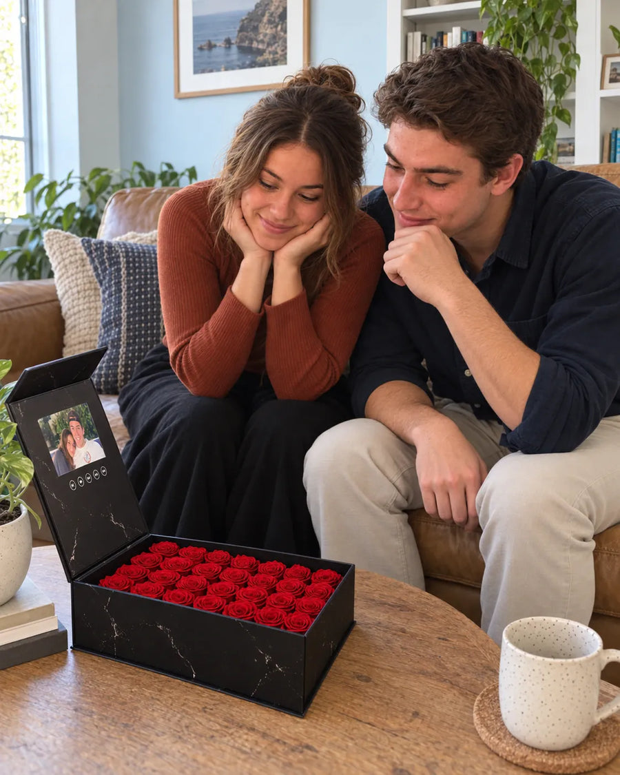 A couple relaxing together beside their rose movie box