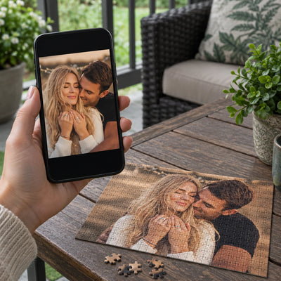 A phone showing a couple photo being chosen